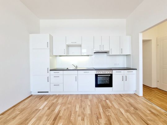 Charmante 2-Zimmer-Altbauwohnung mit Lift - Foto 1