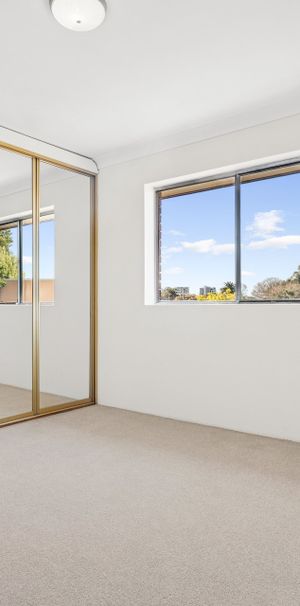 Sophisticated and Stylish Two Bedroom Apartment with Parking - Photo 1