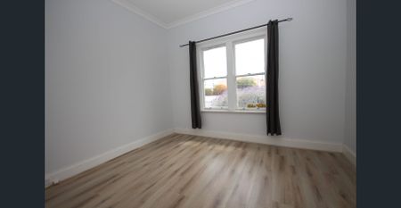 Fresh Three Bed Home in Convenient Location - Photo 2