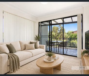 NORTH-FACING PARK VIEWS & STYLISH TOP-FLOOR LIVING - Photo 6