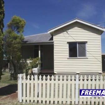 Well-Located Home with Generous Outdoor Space - Photo 1