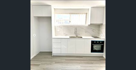 Available now!!!For Rent – Modern 2-Bedroom Ground-Level Unit with Lock-Up Garage - Photo 2