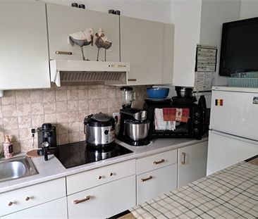 Een appartement op de eerste verdieping met garage en tuintje - Foto 5