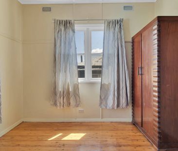 Classic Comfort in Centenary Heights - Photo 1