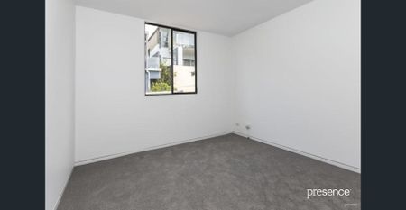 BEACHFRONT LIVING IN THIS SPACIOUS AND TIDY RESIDENCE - Photo 2