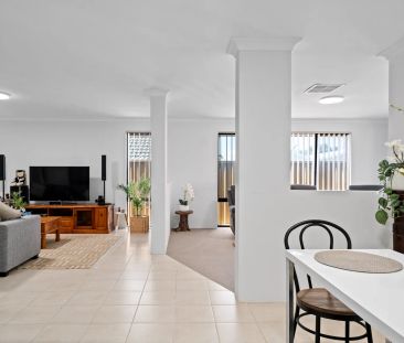 Immaculate 4x2 Family Home with Multiple Living Areas - Photo 4