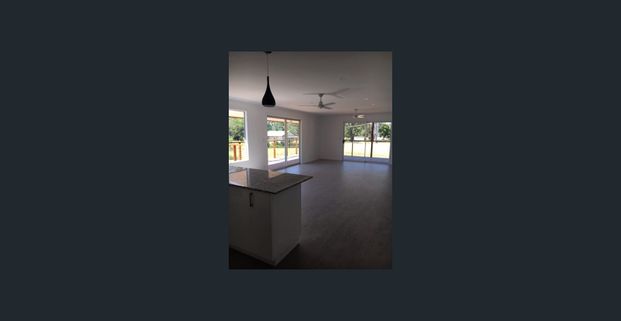 SPACIOUS FAMILY HOME WITH A LARGE BACKYARD! - Photo 1