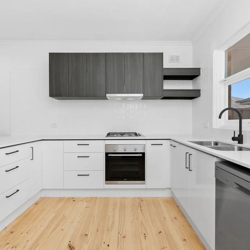 Modern, Fully Renovated Unit in a Convenient Location - Photo 1