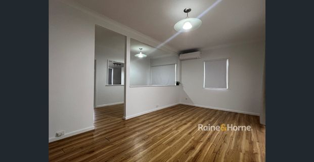 FRESHLY RENOVATED HOME WITH SELF CONTAINED STUDIO - Photo 1