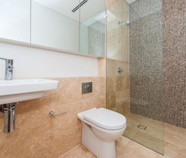 Townhouse Style Two Bedroom with Parking and Storage - Photo 6