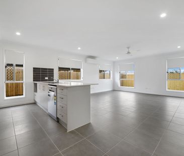 Spacious and Modern Living: 4-Bedroom Family Home with Double Garage. - Photo 1