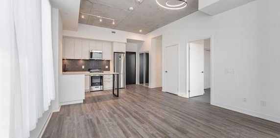 STUNNING CORNER UNIT LOFT WITH W/O TERRACE 1+1 PARKING INCLD - Photo 2