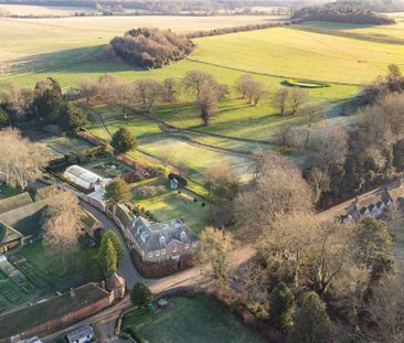 A substantial Grade II listed country residence with 7 to 9 bedrooms, exceptional gardens, and far-reaching countryside views in a desirable village setting. - Photo 6