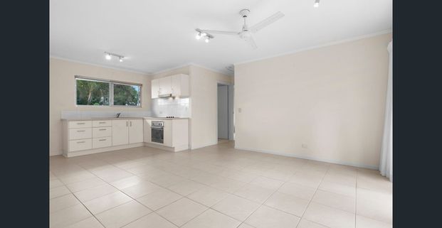 Convenient Top Floor Beachside Living - Photo 1