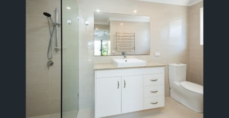 MODERN WATERFRONT ENTERTAINER WITH SKYLINE VIEWS IN BENOWA WATERS - Photo 4