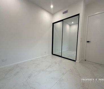 Spacious Modern Home with Custom Features in Elara! - Photo 3