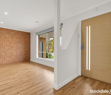 Stylishly Updated Home with Multiple Living Zones - Photo 1