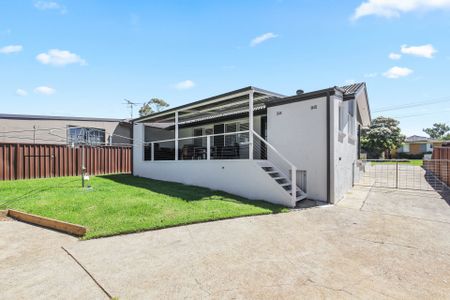 Elegant Family Home with Side Access & Large Garage in Peaceful Camden South - Photo 4