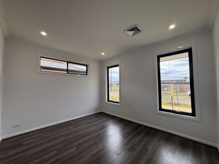 Space, Style & Security: Your Ideal Family Home Awaits - Photo 3