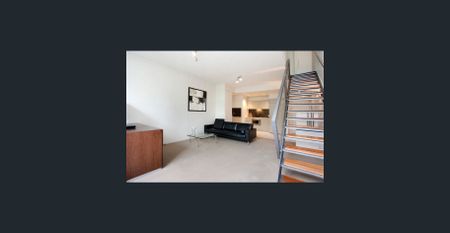 NORTH FACING DUAL LEVEL APARTMENT WITH STUDY - Photo 2