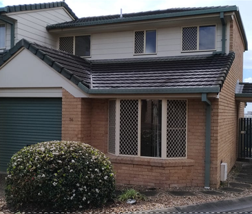 This comfortable 2-bedroom townhouse is in a perfect location ($500... - Photo 2