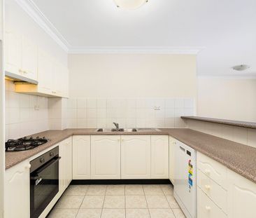 Well Maintained Ground Floor 2 Bedroom Unit - Photo 2