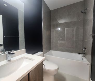 Stunning Three Bedroom Townhouse with Huge Roof Top Patio, Yard and... - Photo 6