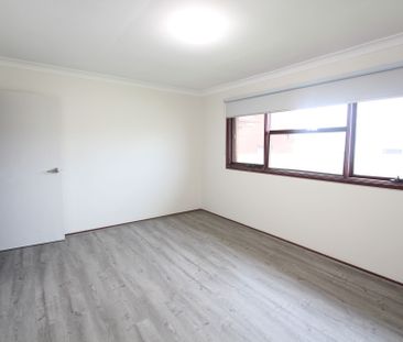 Immaculate Freshly Painted 3 Bedroom Brick Home - Photo 6