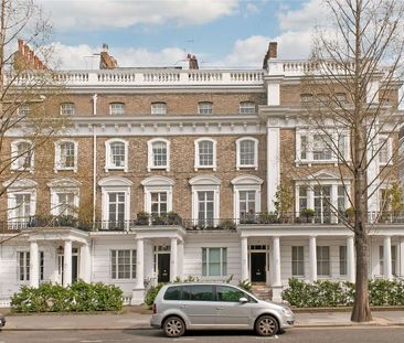 This is a two double bedroom property situated on the third floor of a white stucco fronted building in South Kensington. - Photo 1