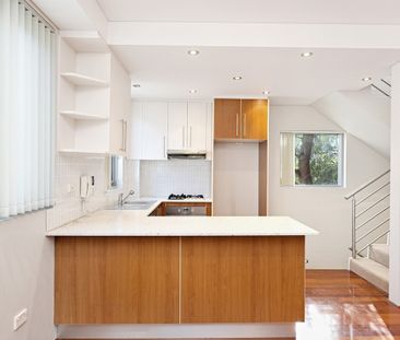 Modern Tri-Level Home in Prime Inner-West Location - Photo 2