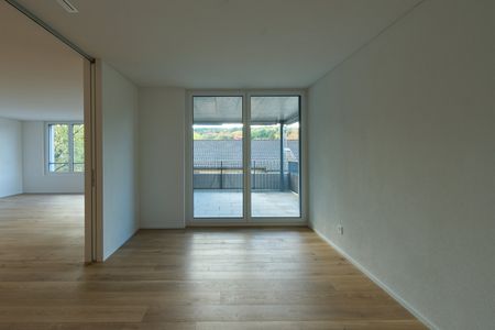 "WOHNEN IM EIGENTUMSSTANDART | moderne 2.5-Zimmer-Wohnung mit grosser Loggia (Minergie)" - Photo 5