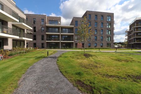 Een BEN-nieuwbouwappartement op het gelijkvloers met 2 slaapkamers, terras, autostaanplaats en kelderberging. - Foto 2