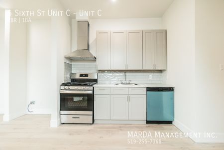 MODERN 2 BED/1 BATH LOCATED IN CHATHAM + HYDRO - Photo 3