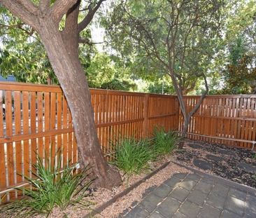 Secure Apartment with Courtyard - Photo 1