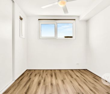 Sleek and Stylish City Apartment - Photo 2