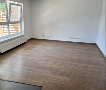 Geschmackvolle, geräumige EG-Wohnung mit zwei Zimmern - Foto 1