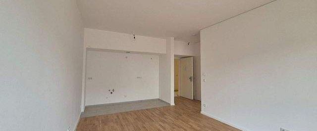 Erstbezug nach Sanierung - Schicke 2-Zimmer mit Parkett, EBK, Balkon u. Fußbodenheizung - Foto 1