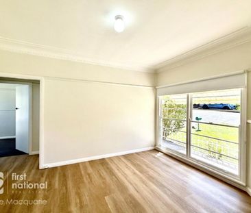 Freshly Renovated & Lawn maintenance included - Photo 1