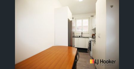 Situated on the first floor of a well maintained security building, this cozy one bedroom apartment features - Photo 2