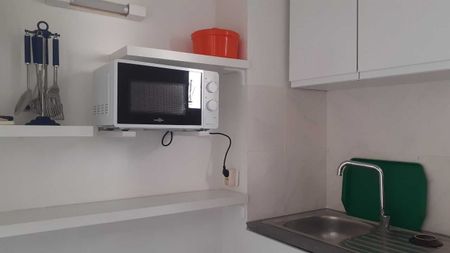 Location Appartement 1 pièce 20m² NIMES 30000 - Photo 4
