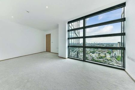 This superb two bedroom duplex apartment on the 27th and 28th floors, enjoys unparalleled views over Canary Wharf and the quayside at West India Quay. - Photo 3