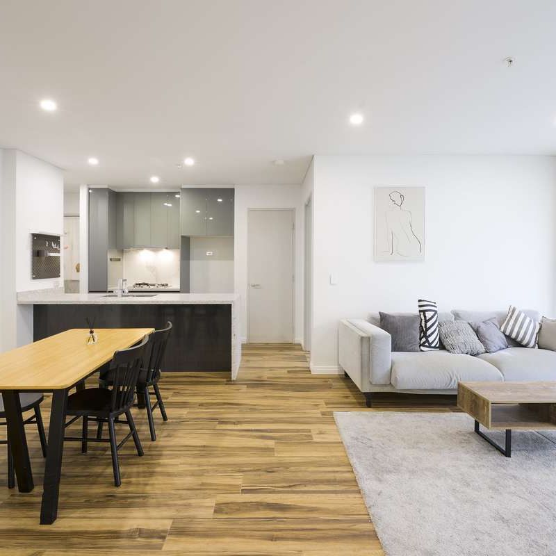 Contemporary 2-Bed Apartment I Furnished I Gym & Pool - Photo 1