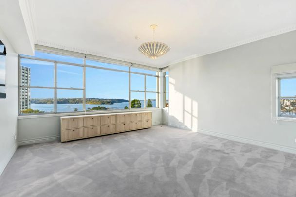 ARCHITECTURALLY DESIGNED BOUTIQUE STYLE APARTMENT WITH STUNNING WATER VIEWS IN PRESTIGIOUS WINSLOW GARDENS - Photo 1