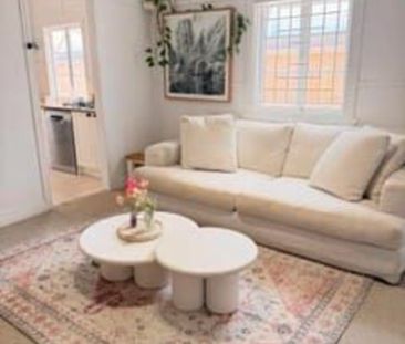 Coastal Charm with Tropical Garden Oasis! - Photo 2