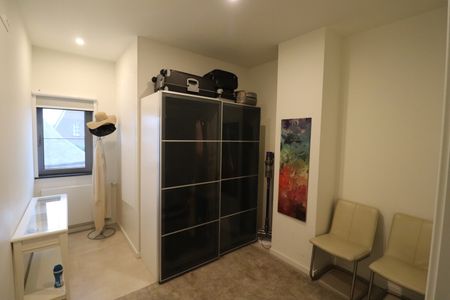 Modern en energiezuinig 2-slaapkamerappartement met carport en ruim terras. - Foto 2