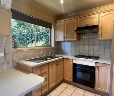 Two bedroom unit in beautifully landscaped surroundings. - Photo 5