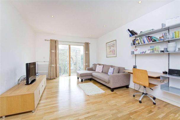 Two bedroom modern apartment with a balcony in Dalston. - Photo 1