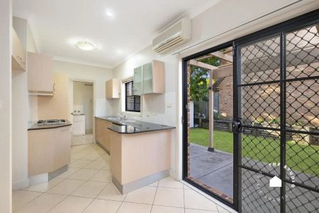 “Charming Two-Bedroom Townhouse” - Photo 2