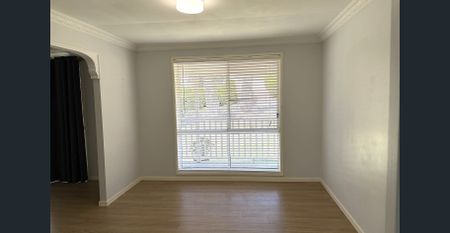 A GREAT FAMILY HOME - Lawn Maintenance Included - Photo 2