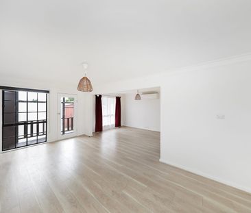 Spacious Family Living with large Backyard in a Prime Location. - Photo 1